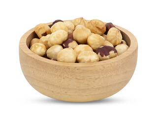 Hazelnuts in wooden bowl on transparent png