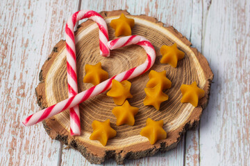 Candy Canes with Star Beeswaxes on Wood Slice