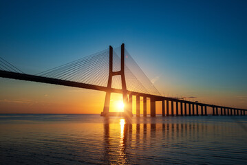 Vasco da Gamma road bridge in Portuguese capital Lisbon at sunrise.