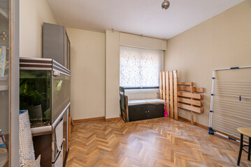 Teen bedroom with a loft bed, a study area underneath, and a built-in wardrobe with sliding doors