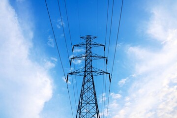 The high voltage tower with blue sky.