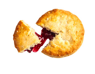 Mini cherry pie with one wedge removed and ruby filling oozing from buttery flaky crust, rustic bakery dessert on isolated background