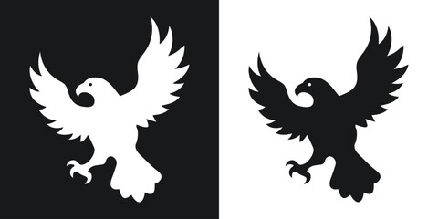 Two contrasting silhouettes of an eagle in flight representing strength and freedom