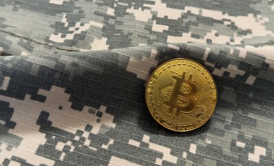 Gold bitcoin and soldier in military uniform