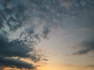 Obraz premium Cloudy sunset sky cloudscape sunlight background in summer season.