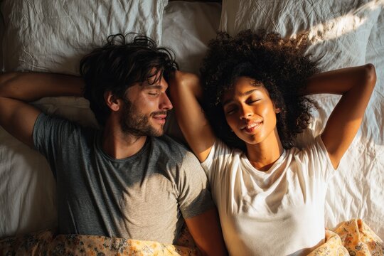 Interracial Couple Stretching on Bed in Morning After Waking Up at Home - Powered by Adobe