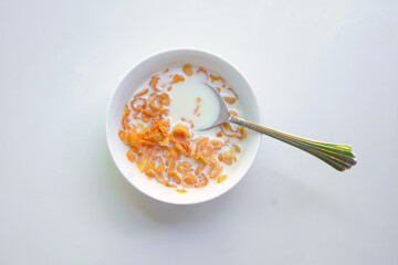 Breakfast Cereal with Milk in White Ceramic Bowl.