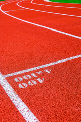 Running track in the stadium, sport background and texture. Running track for athletics