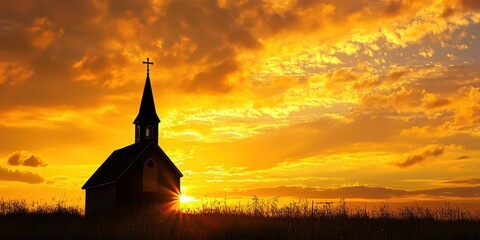 A silhouetted church stands against a vibrant, golden sunset. The churchâ€™s steeple and cross are prominent, illuminated by the radiant light. 