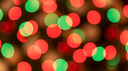 Festive red and green Christmas light bokeh creating an abstract holiday background