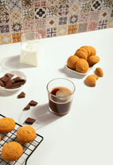 Coffee espresso with chocolate pieces and cookies.