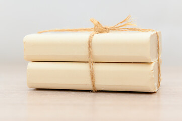 White handmade soap on a wooden background. Natural product.