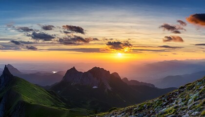 Panorama Of Beautiful Sunset Over The Mountain Range With Clouds In The Sky