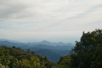 Misty Mountain Range and Cloudy Sky in Tropical Highlands