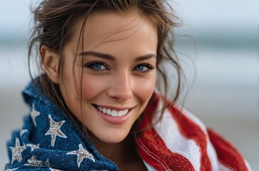 portrait of a smiling woman holding an american flag, standing on the beach.