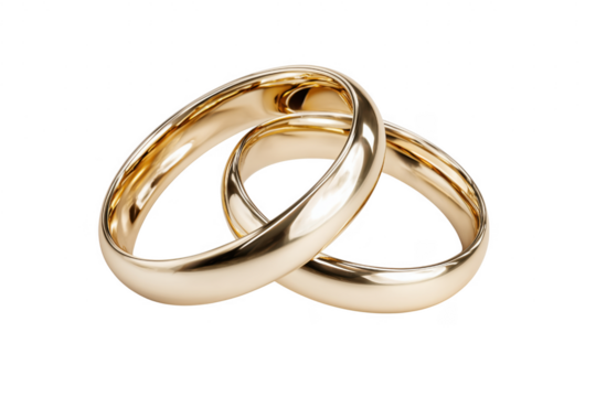 Elegant pair of gold wedding rings interlocked on a dark black background
