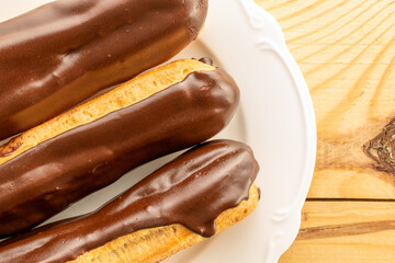 Chocolate sweet eclair top view, macro.