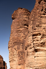 A stern face in a rock near Al Ula in Saudi Arabia