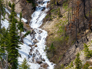Wild Idaho river forms a waterfall in spring