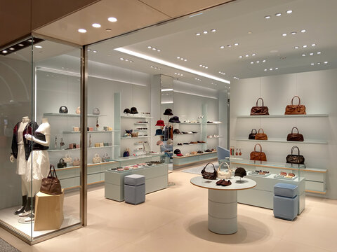 March 26, 2025: A luxury retail outlet Miu Miu showcases a variety of stylish and trendy designs of handbags, purses, and accessories at Taoyuan Airport in Tapei, Taiwan.