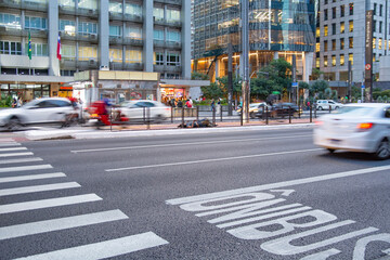Sao Paulo, SP, Brazil - February 7, 2025. Vehicle and pedestrian movement on Paulista Avenue, central region of Sao Paulo