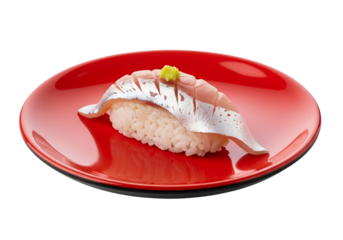 Close-up of a single piece of sushi with a vibrant red plate.
