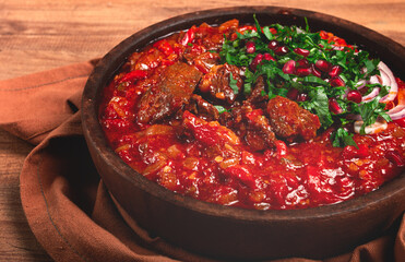 Chashushuli, a traditional Georgian dish, spicy, stewed meat with tomatoes and spices, homemade, no people,
