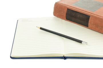 Open spiral notebook with blank pages and pencil, with orange hardcover book, isolated on white background with clipping path.