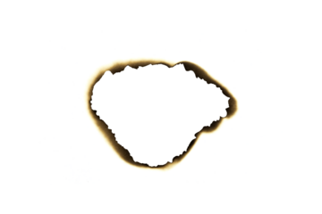 Burnt irregular hole in paper with dark edges isolated on white background with clipping path.