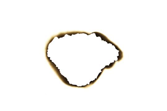 Burnt irregular hole in paper with dark edges isolated on white background with clipping path.