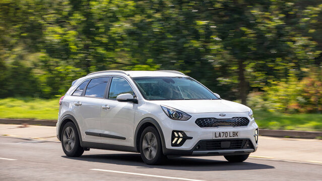 Milton Keynes,Bucks,UK - Sept. 21st 2025: 2021 white Kia Niro hybrid electric car  driving on a British road