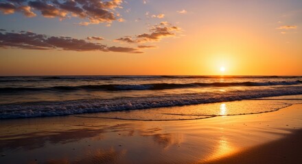 Obraz premium Sunset over Reflective Wet Sand with Foamy Waves and Vibrant Sky Hues