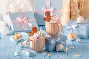 Hot and sweet chocolate as unique Christmas blue background.