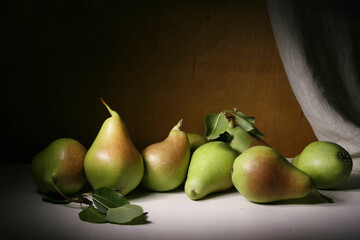 Still life with a group of ripe, juicy, sweet pears.