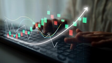 A close-up of hands typing on a keyboard, accompanied by vibrant stock market graphs and charts, reflecting the dynamic world of finance and investment opportunities. Copula