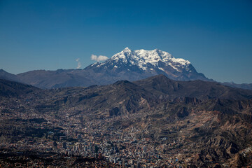 Beautiful mountain with snow on the top. Blue sky. Beautiful mountain landscape in La Paz, Bolivia.
