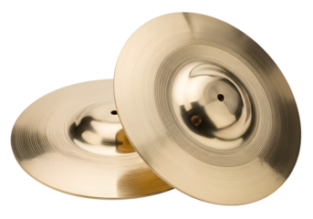 Two golden cymbals sit atop a dark background, showcasing their smooth, ribbed surfaces and central holes.