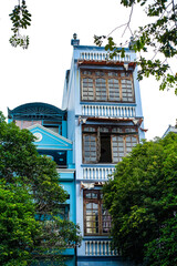 City view with local people, houses, restaurants, vendors and traffic in Ho Chi Minh City, Vietnam, July 2025