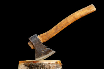 Antique axe with wooden handle on black background