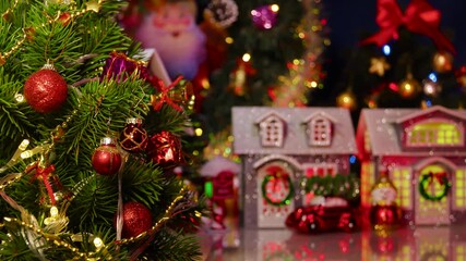 Evening Christmas town with decorated Christmas trees around