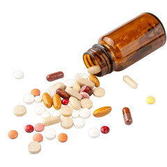 Amber bottle spilling assorted pills isolated on a transparent background image