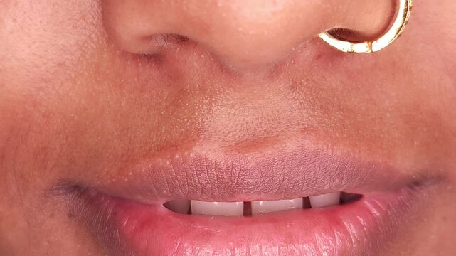 Attractive young girls lips and mouth, healthy skin face without makeup. Young woman face with sexy lips.