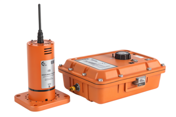 Orange communication devices for industrial use. One is a cylindrical transmitter with an antenna, and the other is a rectangular control box with various ports.