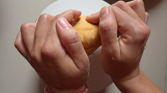 Indian women kneading chapati dough