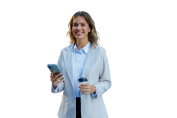 Professional businesswoman smiling, holding smartphone and coffee, wearing wireless earbuds with transparent background