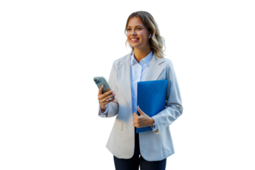 Young businesswoman smiling, wearing blazer and earbuds, holding phone and blue folder, looking away
