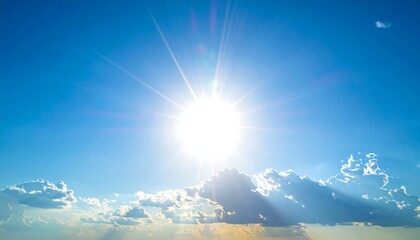 Bright sun shining through fluffy clouds