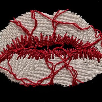 Embroidered patch of lips with a cracked red thread design on black