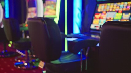 Experience the Exciting Slot Machines in a Vibrant and Colorful Casino Environment - Powered by Adobe