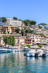 Port de Soller town on Mallorca island marina with yacht boats vacation by the sea portrait format in Spain